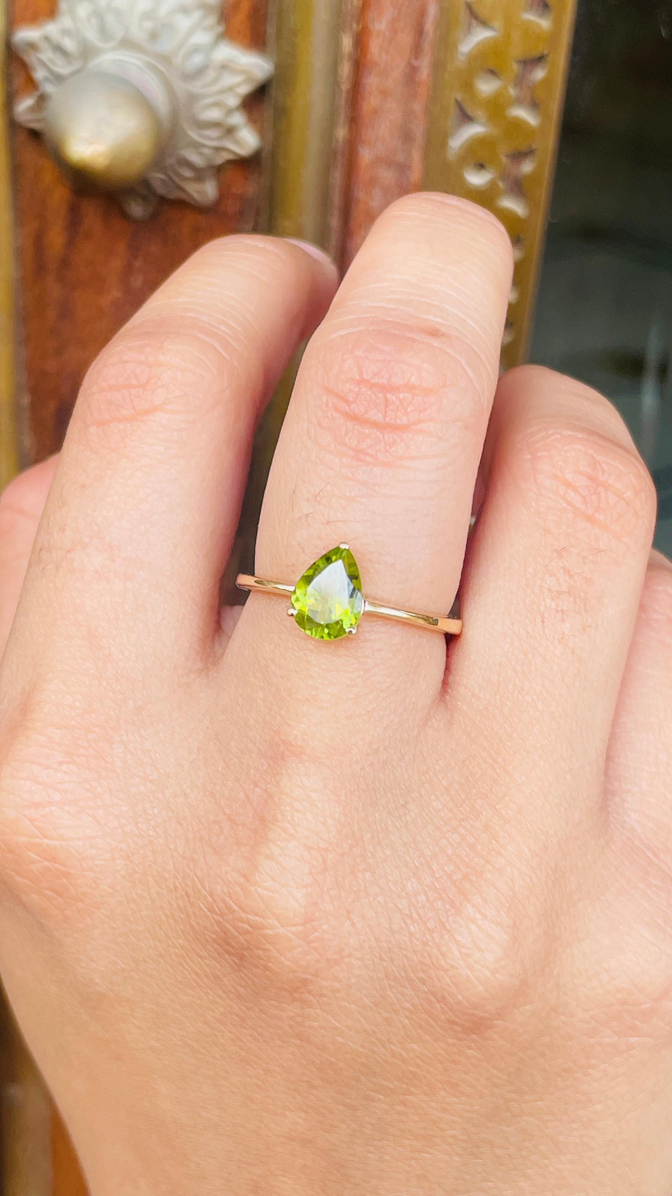 For Sale:  Pear Cut Peridot Solitaire Ring in 14K Yellow Gold 6