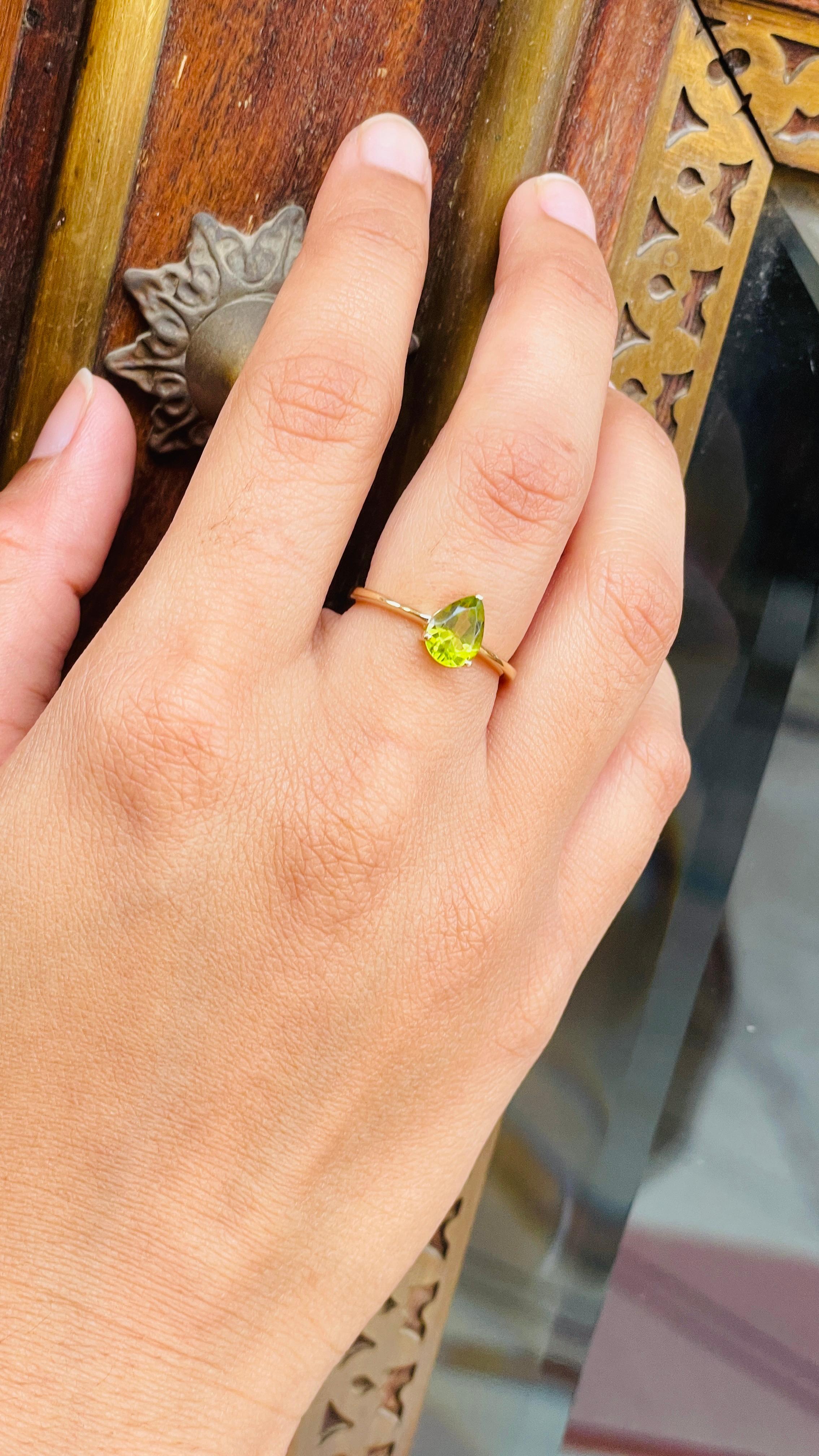 For Sale:  Pear Cut Peridot Solitaire Ring in 14K Yellow Gold 8