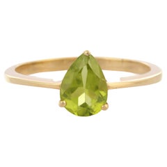 Anello solitario con peridoto taglio pera in oro giallo 14K