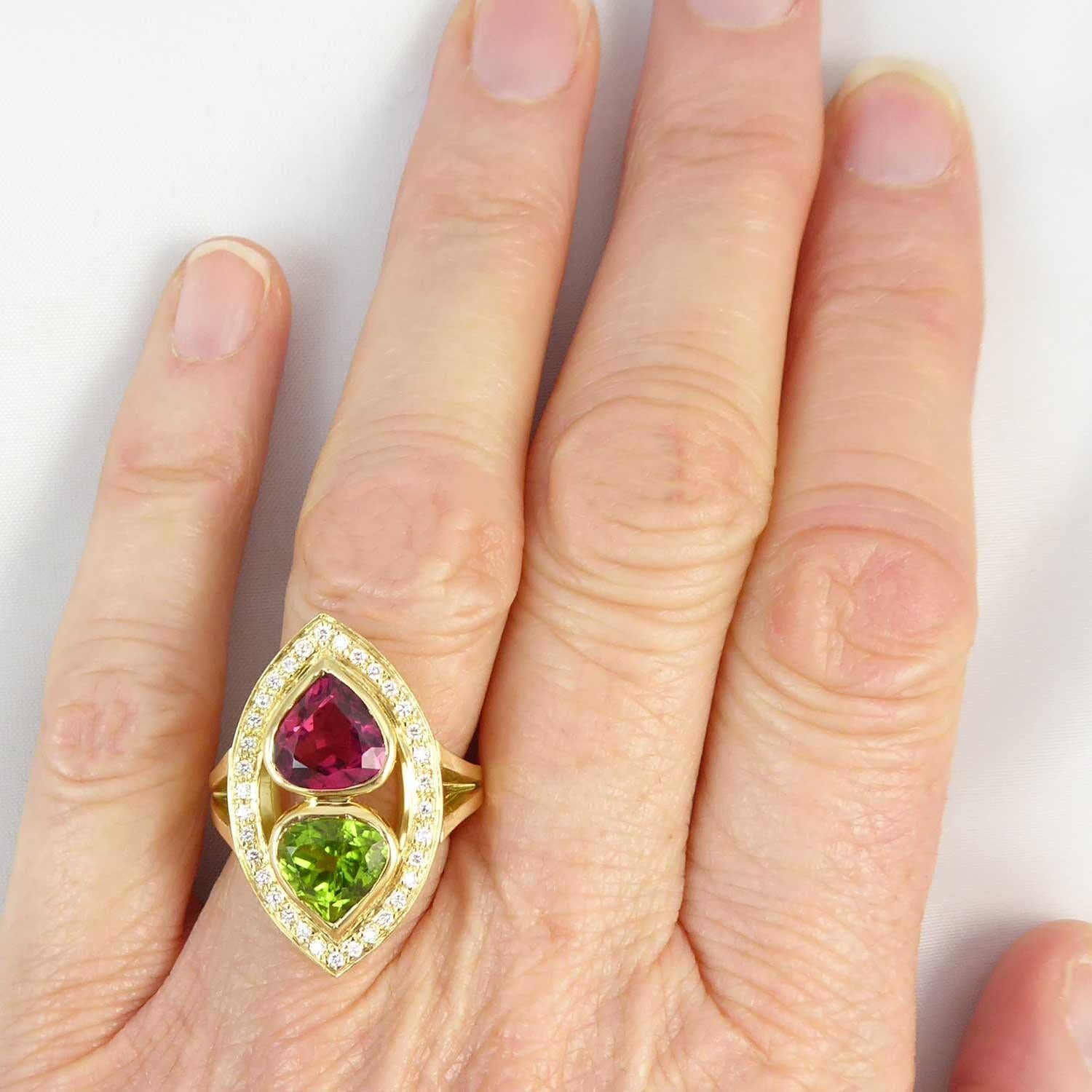 Contemporary Pear Cut Pink Tourmaline and Peridot Cocktail Dress Ring, Marquise Diamond Halo