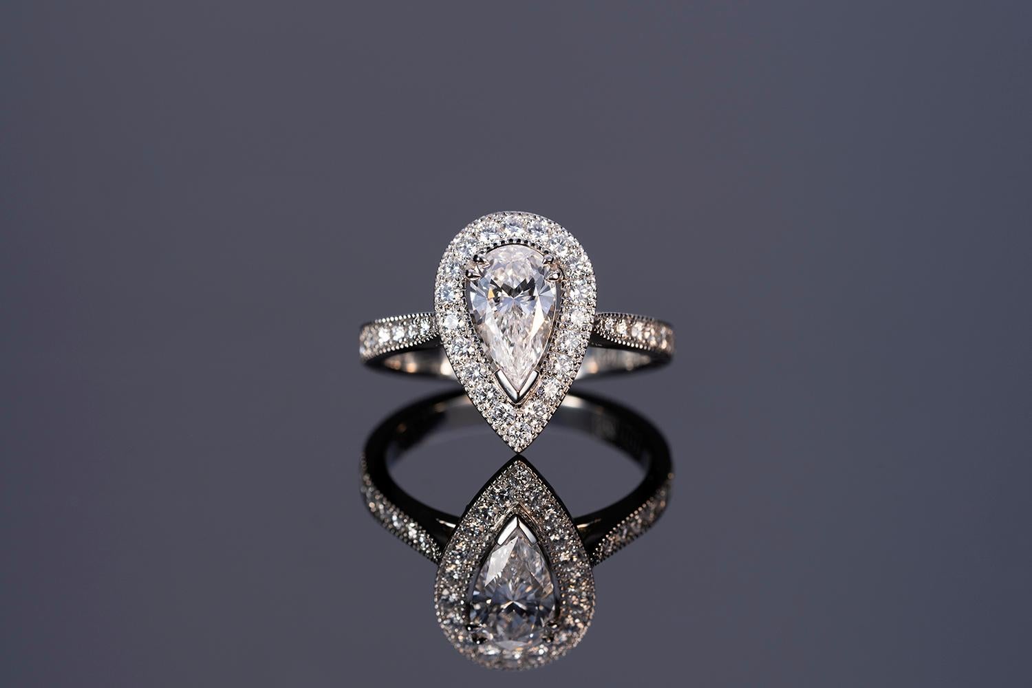 Art Deco GIA Certified Pear Cut Platinum Diamond Ring For Sale