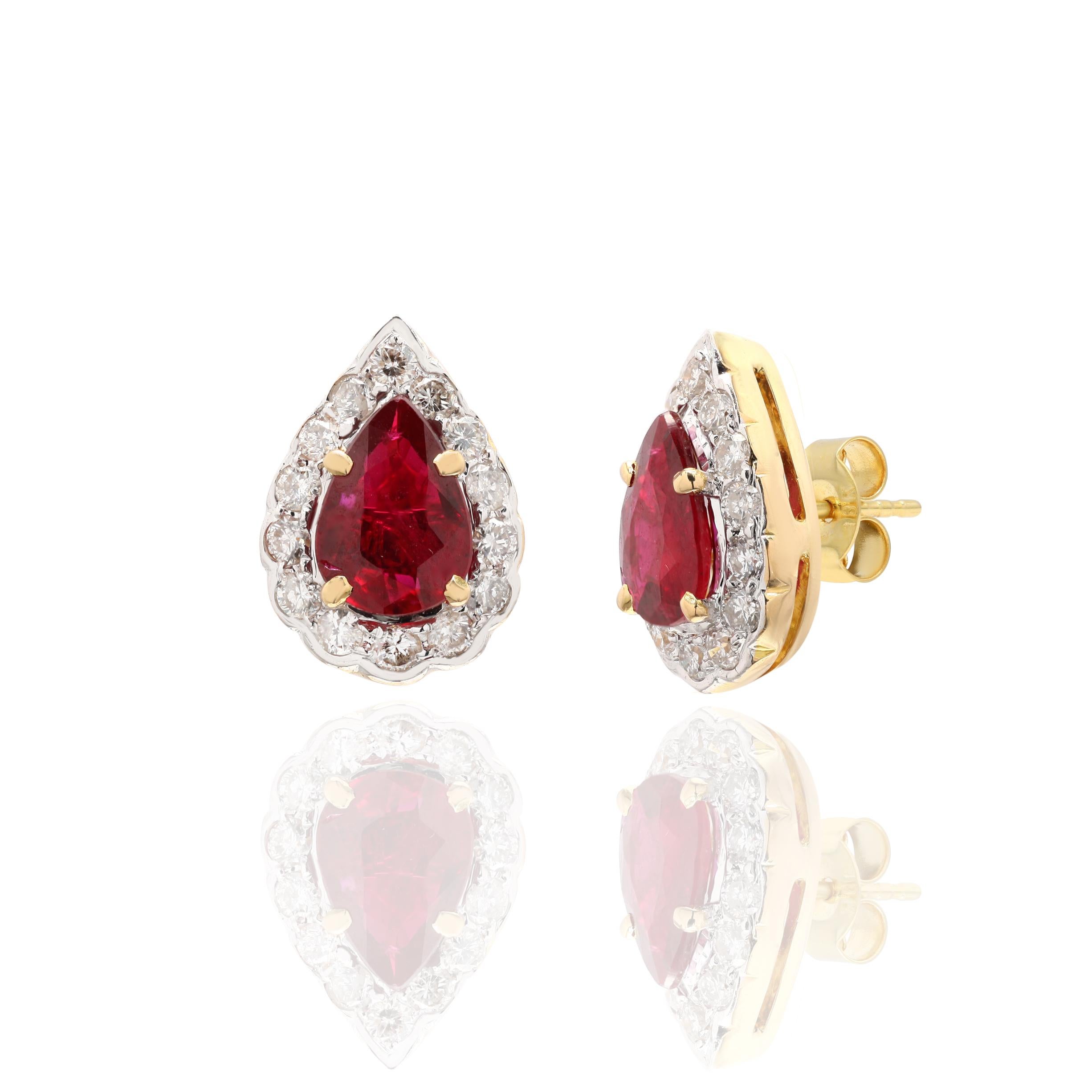 Pear Cut Ruby Diamond Halo Studs in 18K Gold. Embrace your look with these stunning pair of earrings suitable for any occasion to complete your outfit.
Studs create a subtle beauty while showcasing the colors of the natural precious gemstones and