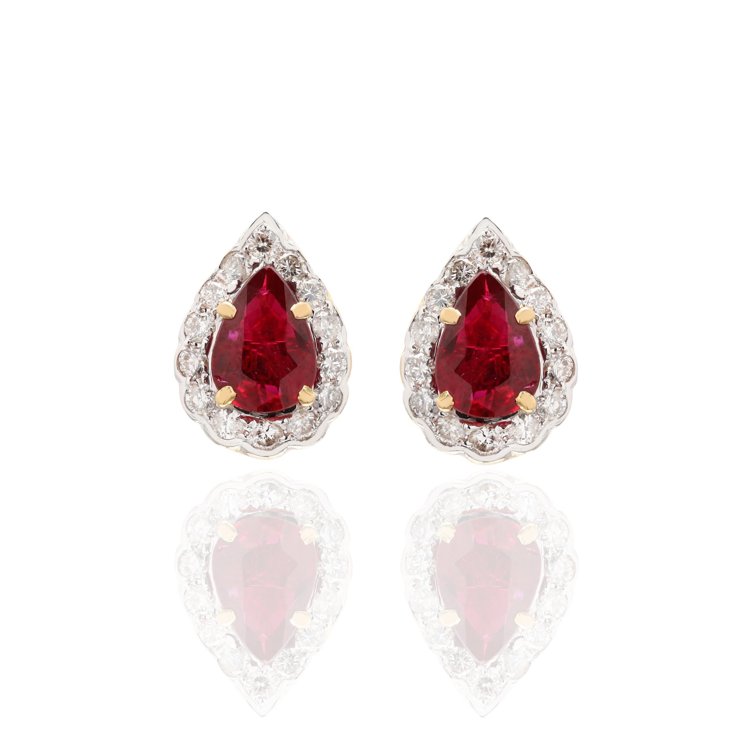 Modern Pear Cut Ruby Amidst Halo Diamond Studs Handcrafted in Solid 18k Yellow Gold For Sale