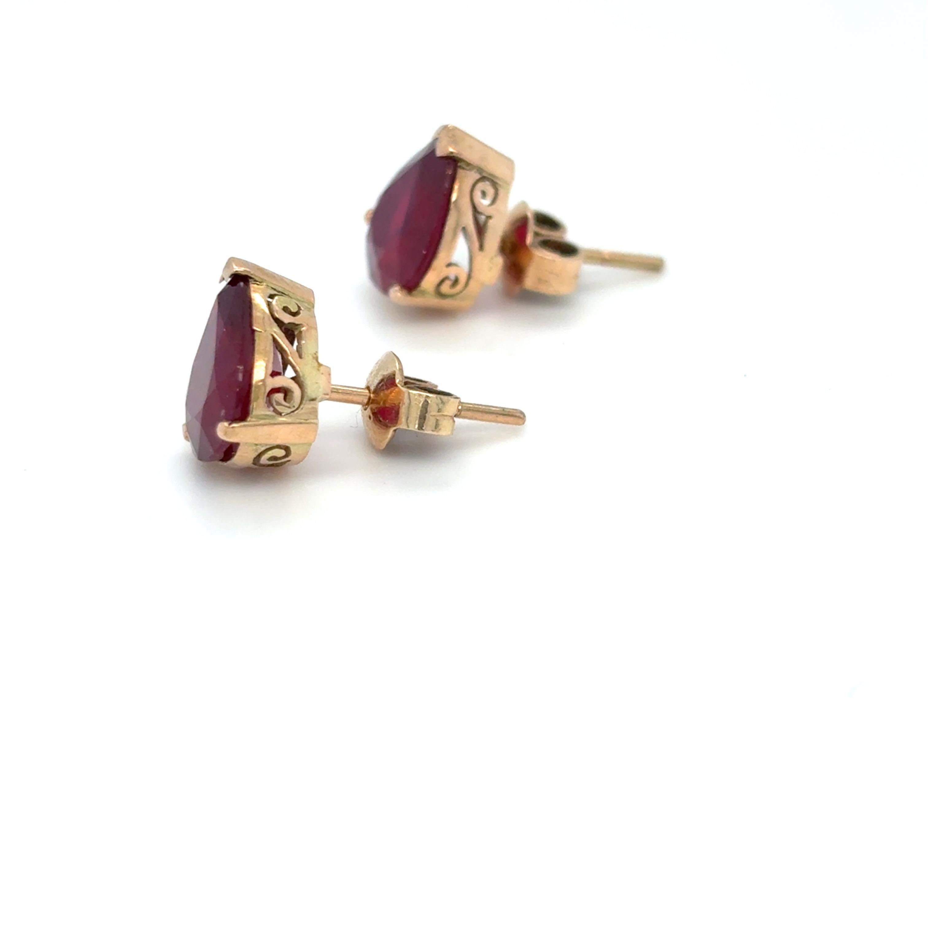 Artisan Pear Cut Ruby Yellow Gold Stud Earrings For Sale
