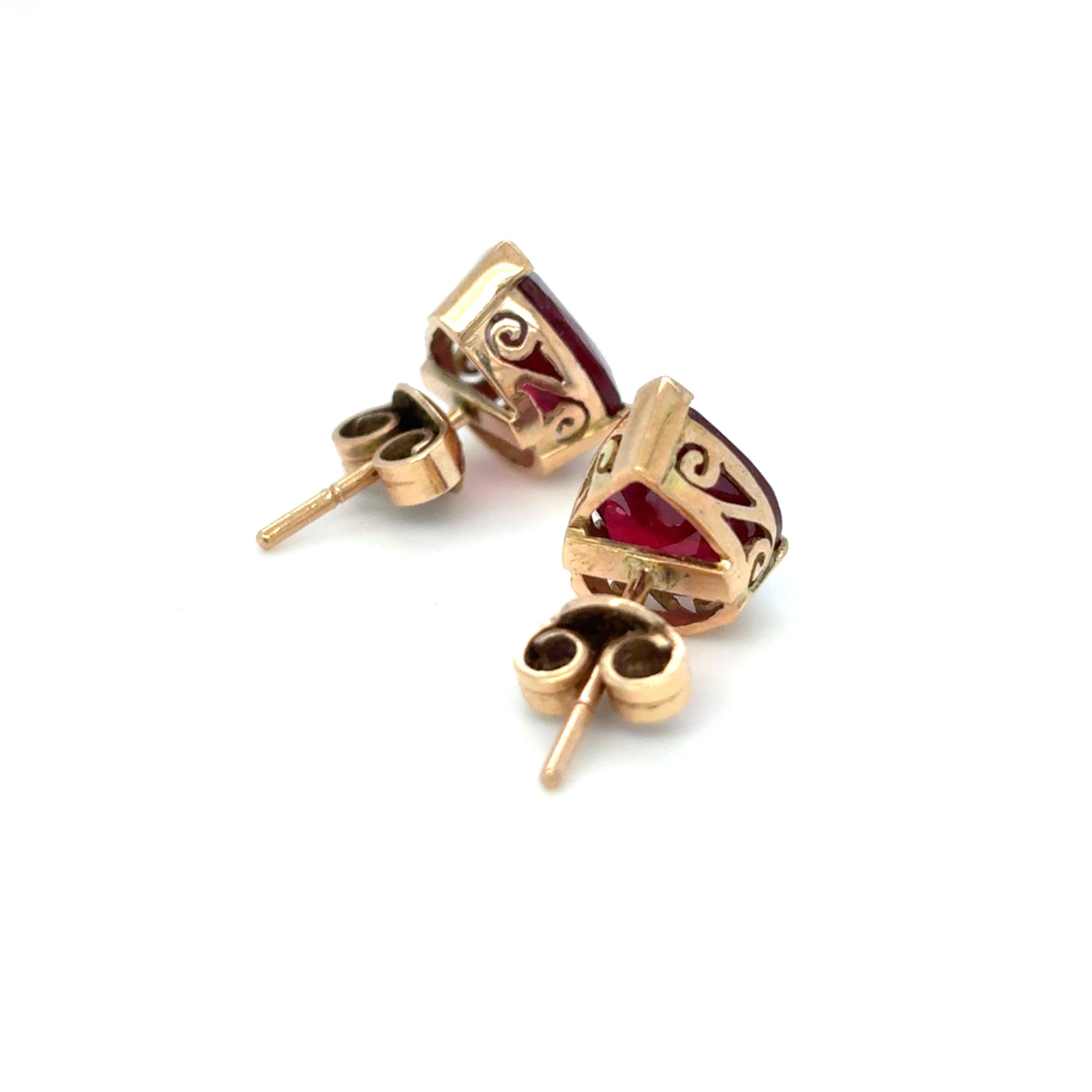 Women's Pear Cut Ruby Yellow Gold Stud Earrings For Sale