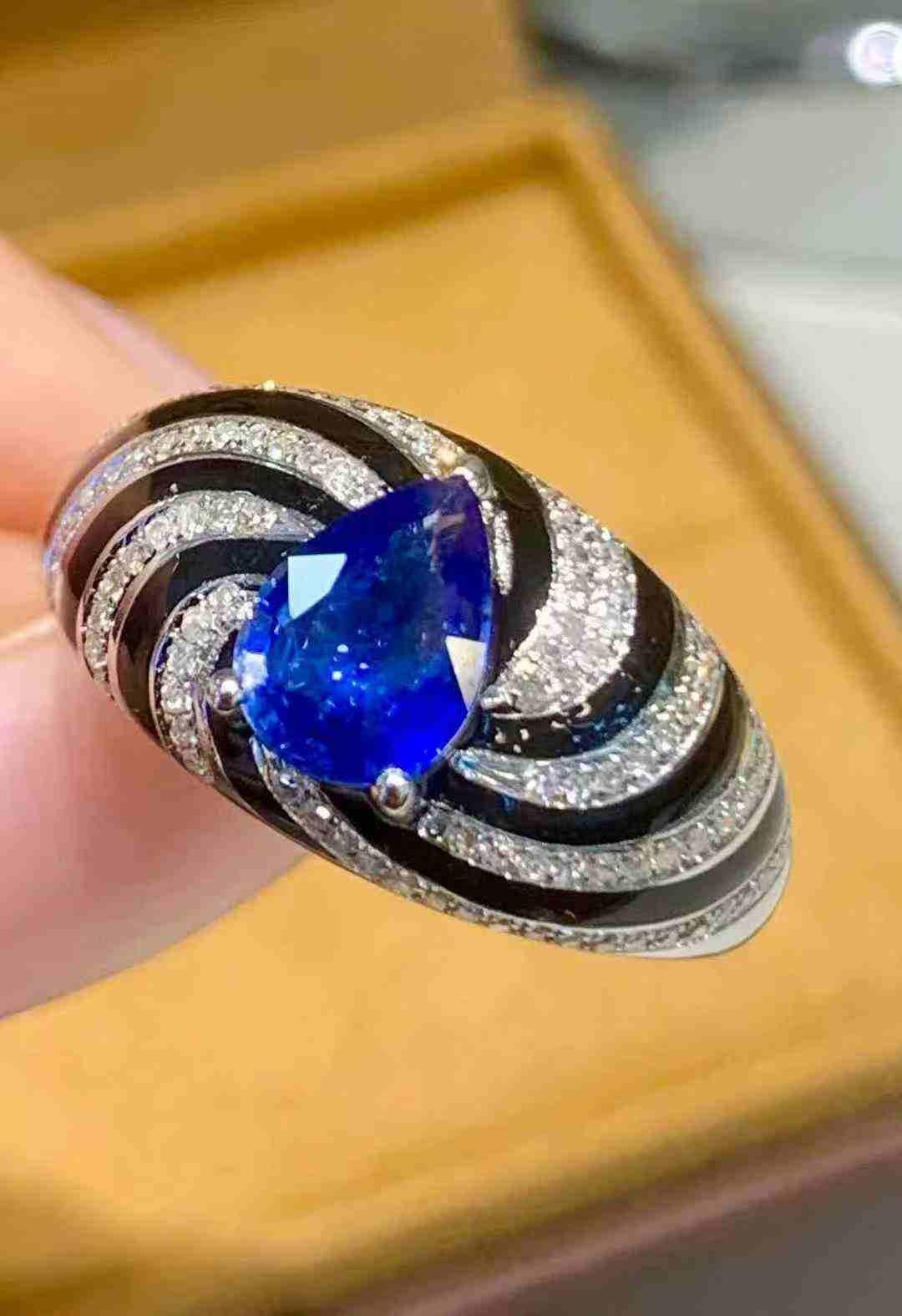 Pear Cut Sapphire Diamond Dome Ring in 18K White Gold For Sale