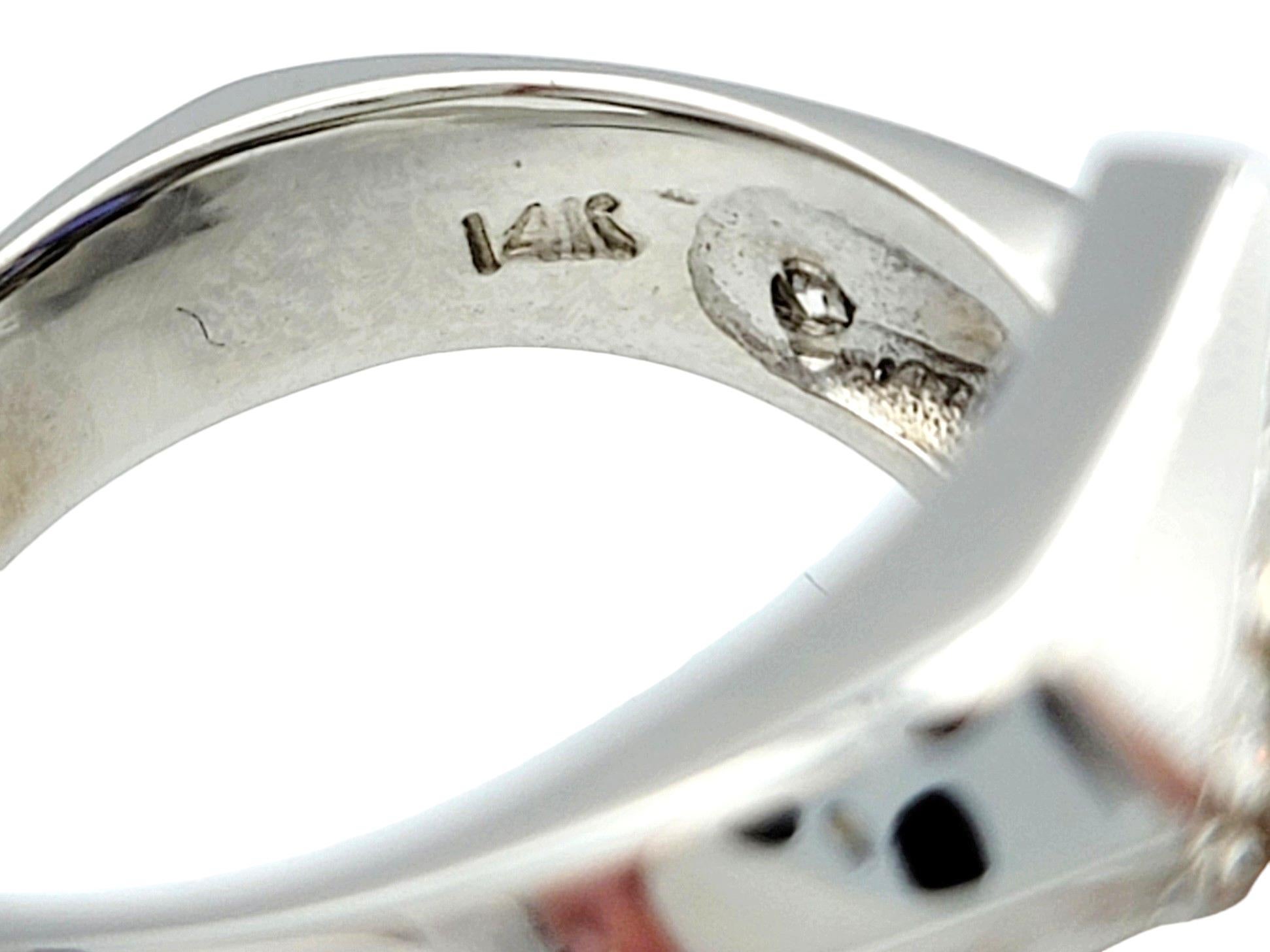 Anello con tanzanite taglio pera e diamanti in stile bypass in oro bianco 14 carati in vendita 3