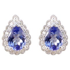 Pear Cut Tanzanite and Diamond Cluster Earrings in White Gold