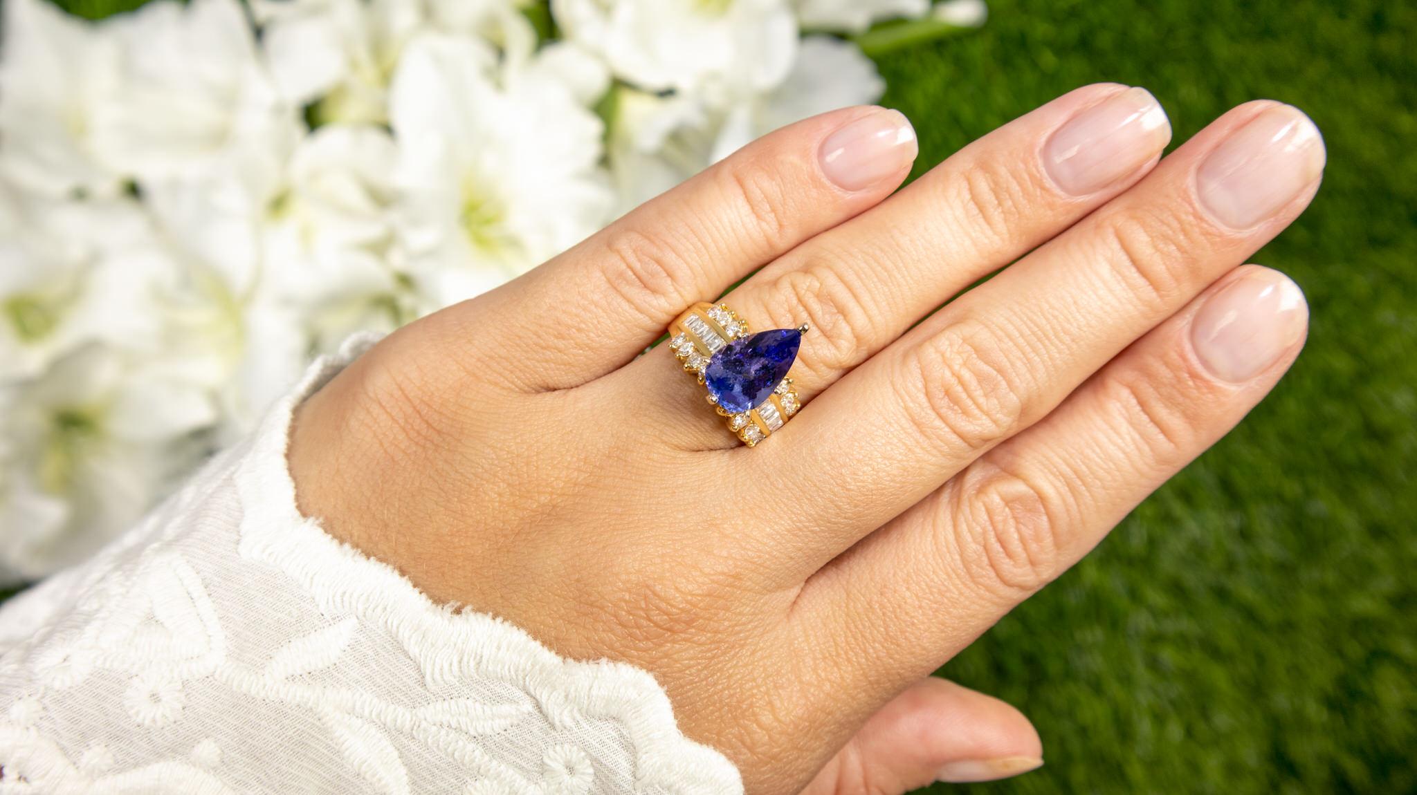 It comes with the Gemological Appraisal by GIA GG/AJP
All Gemstones are Natural
Tanzanite = 2.50 Carats
Cut: Pear
Diamonds = 1.00 Carats
Metal: 18K Yellow Gold
Ring Size: 7* US
*It can be resized complimentary