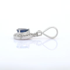 Pear Cut Vivid Blue Sapphire Diamond Pendant Necklace in 18K White Gold