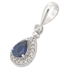 Pear Cut Vivid Blue Sapphire Diamond Pendant Necklace in 18K White Gold