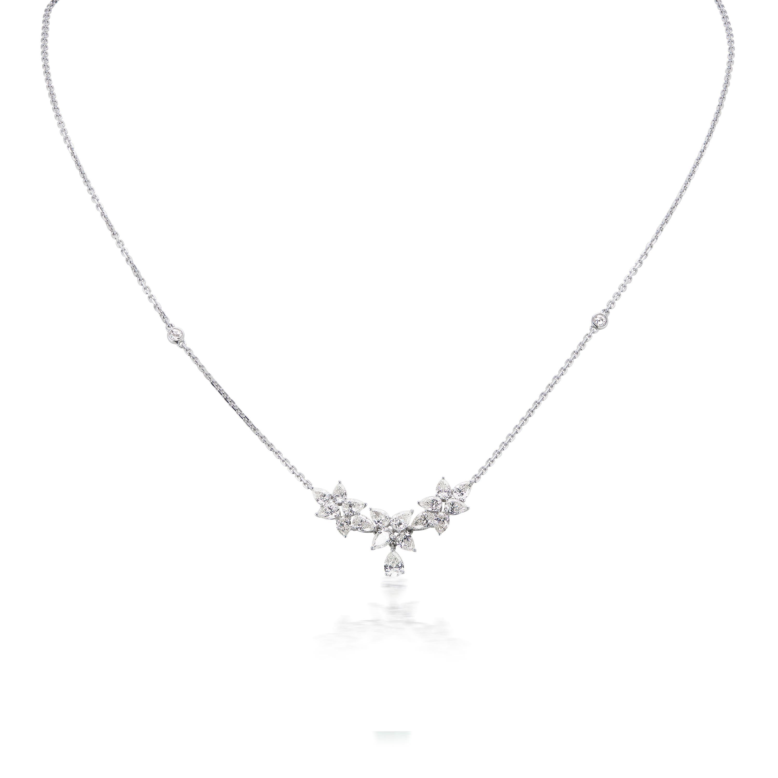 This wonderfully designed prong set jewelry is decorated with rose cut diamonds on its 18K white gold body. The sparkling rose cut diamonds are set in bezel on the 18k white gold necklace. Also, the cable chain necklace has marquise and pear