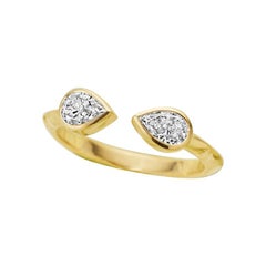 Pear Diamond and 18 Karat Gold Engagement Ring