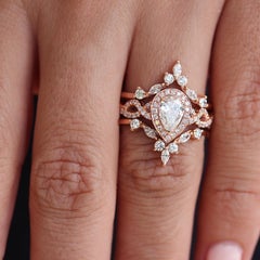 0.70 carat Pear Diamond Halo Twist Shank Engagement Ring & "Iceland" Ring Guard