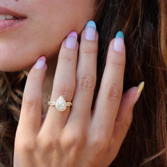 Pear Diamond Infinity Twist Shank Engagement Ring "Zeus"