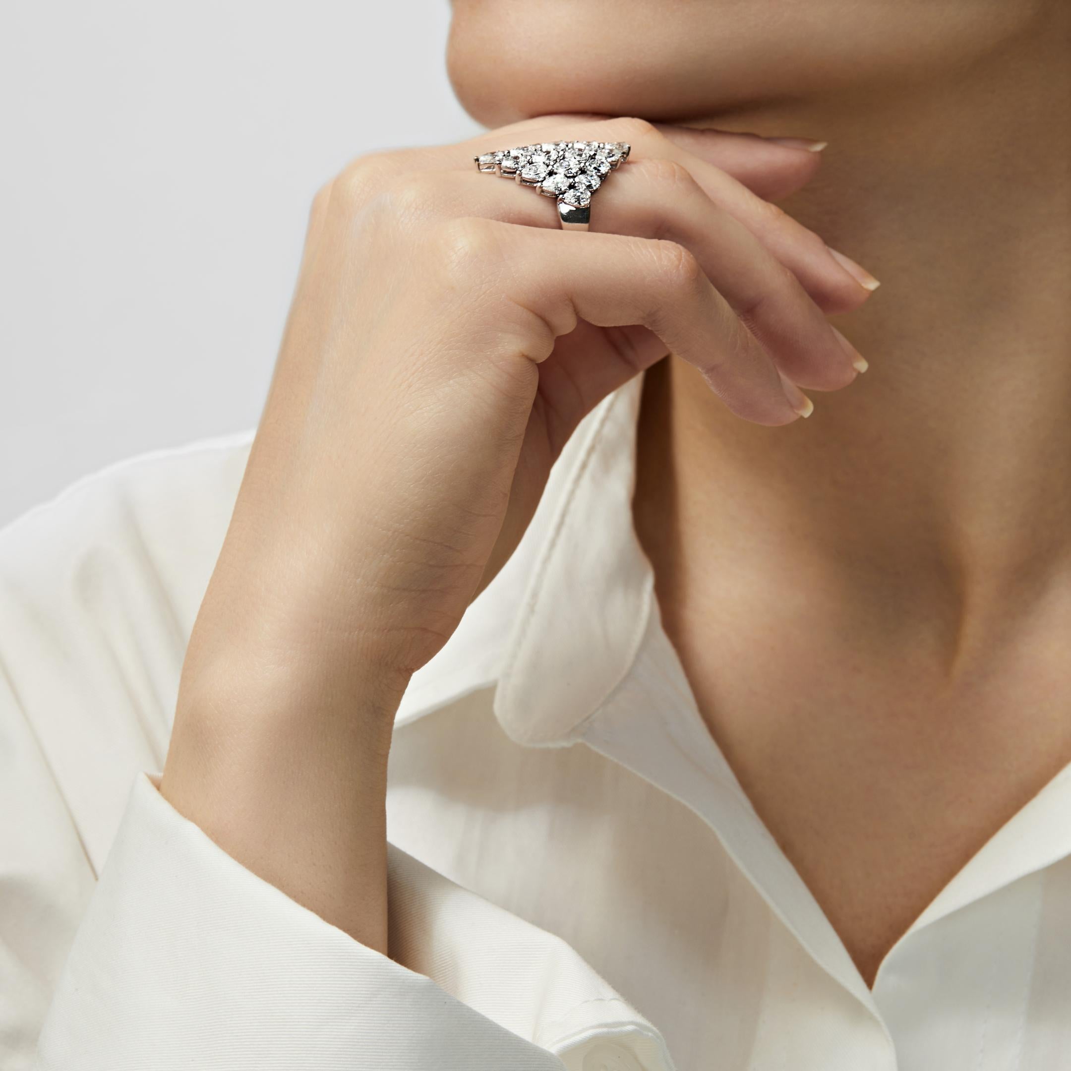 Who couldn’t use a little protection in the world today? We think 25 pear-shaped diamonds will do the trick! The Pear Diamond Shield Ring features 4.77 carats of white pear-shaped diamonds that lay comfortably against the finger. The sparkling array