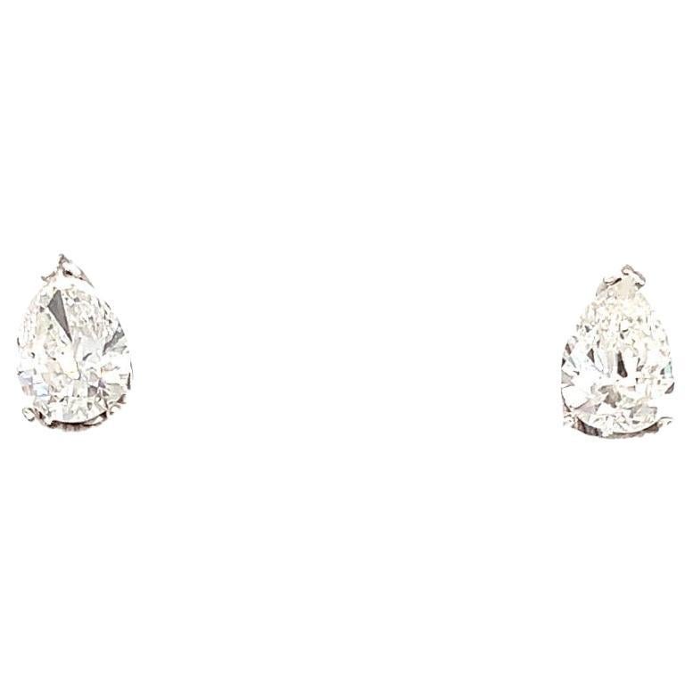 Pear diamond solitaire stud earrings 18k white gold For Sale