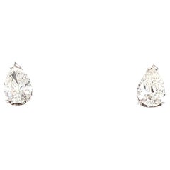 Pear diamond solitaire stud earrings 18k white gold