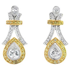 Boucles d'oreilles poire diamant jaune halo en or 14K