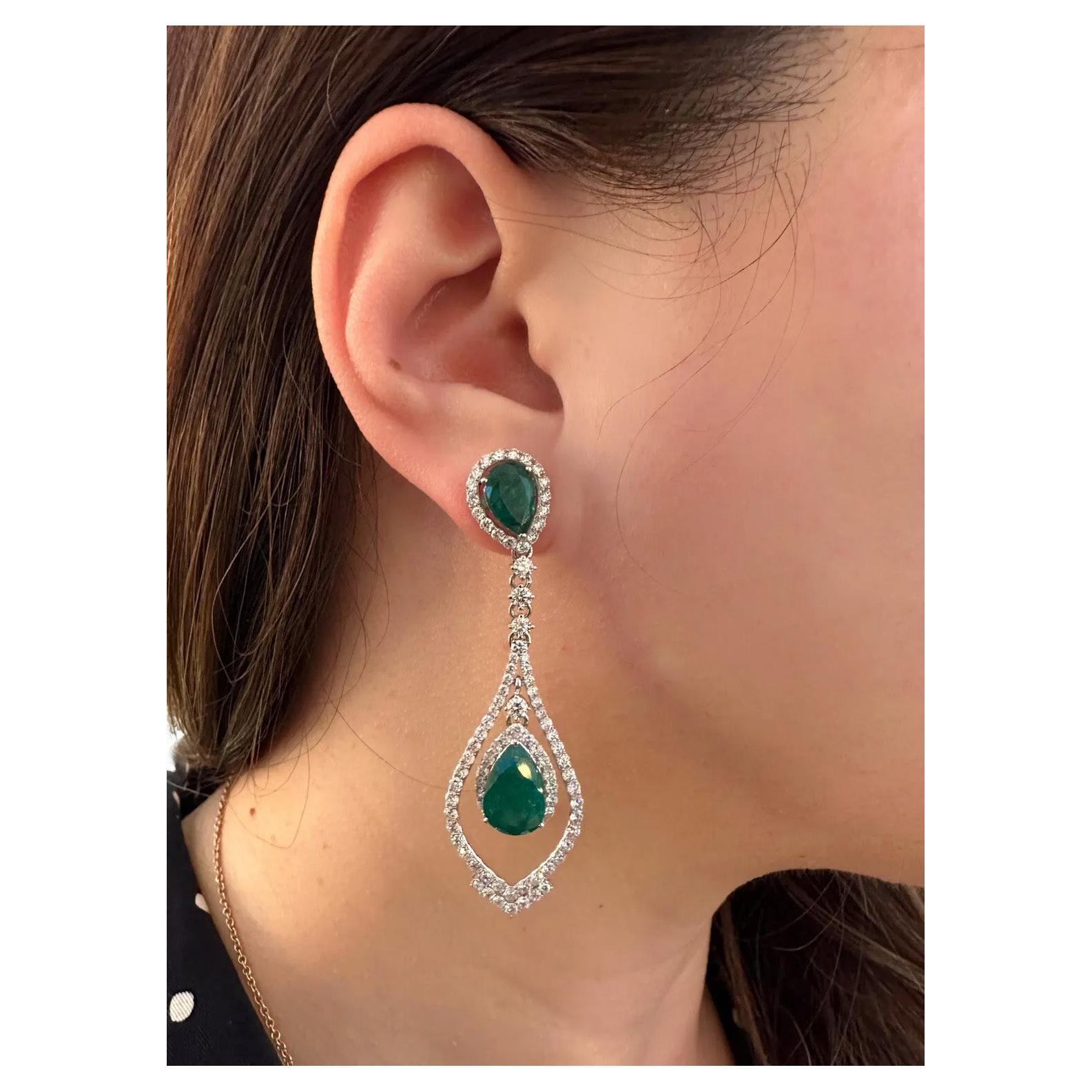 Pear Emerald and Diamond Drop Earrings in 18k White Gold

Long Diamond and Emerald Drop Earrings features 4 Pear shaped Natural Green Emeralds set with Round Brilliant Diamonds in 18k White Gold.

Total emerald weight is 8.60 carats.
Total diamond