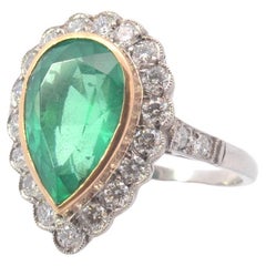 Pear emerald and diamonds ring in 18k gold and platinum