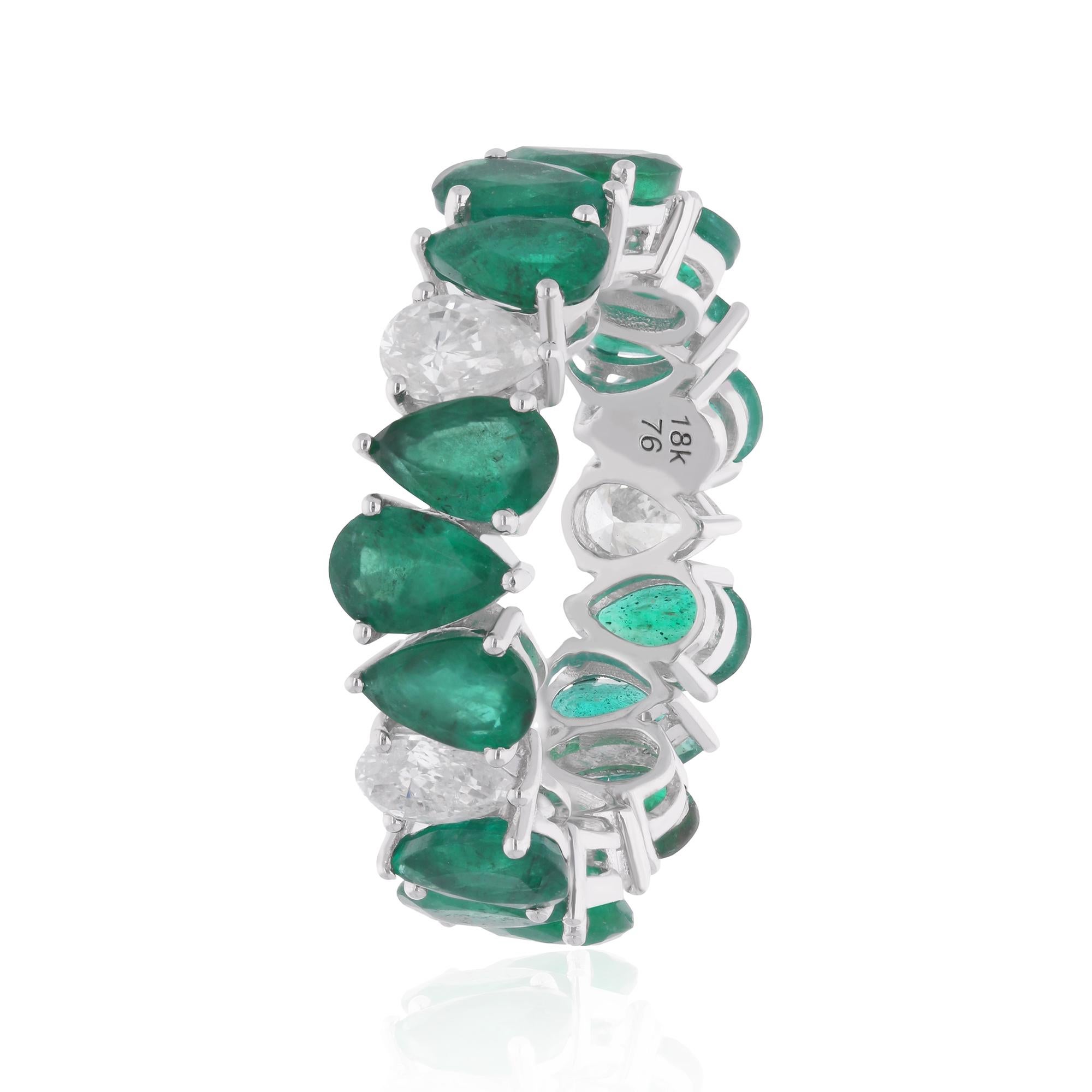 Step into a world of refined elegance with this exquisite Pear Emerald Gemstone Band Ring, adorned with dazzling diamonds and meticulously crafted in 18 Karat White Gold. Designed to captivate and enchant, this ring is a celebration of timeless