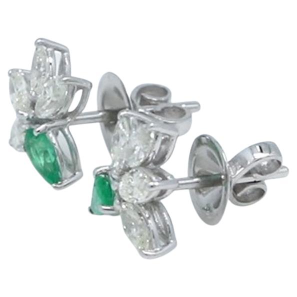 Item Code :- SEE-1432H
Gross Wt. :- 2.80 gm
18k White Gold Wt. :- 2.53 gm
Natural Diamond Wt. :- 1.05 Ct. ( AVERAGE DIAMOND CLARITY SI1-SI2 & COLOR H-I )
Emerald Wt. :- 0.32 Ct.
Earrings Size :- 7 mm approx.

✦ Sizing
.....................
We can
