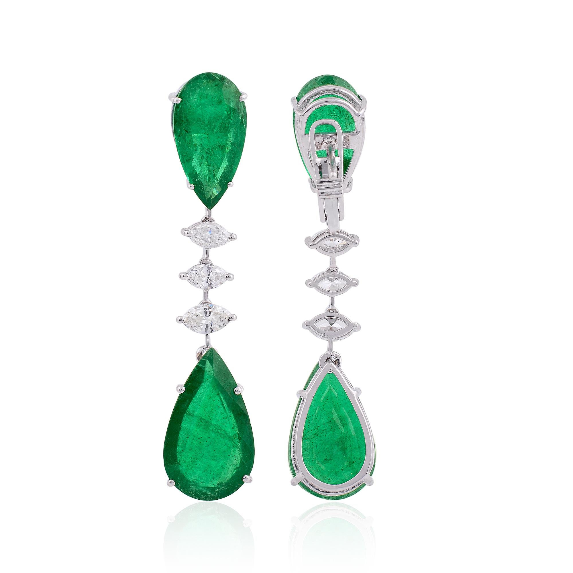 Item Code :- SEE-1351A
Gross Weight :- 10.53 gm
14k Solid White Gold Weight :- 6.17 gm
Natural Diamond Weight :- 1.31 carat  ( AVERAGE DIAMOND CLARITY SI1-SI2 & COLOR H-I )
Zambian Emerald Weight :- 20.49 carat
Earrings Size :- 50 mm approx.

✦