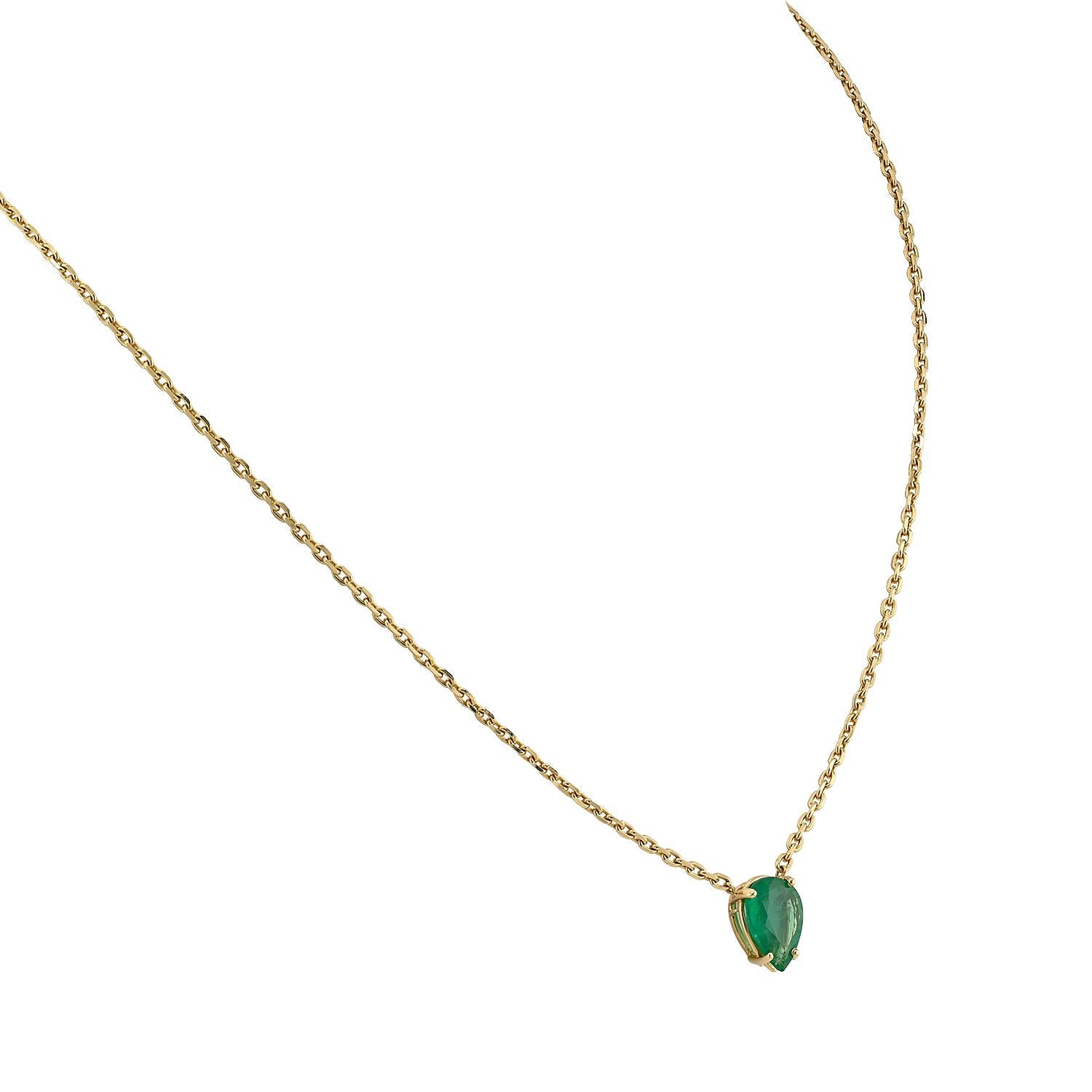 Radiating timeless sophistication, this Emerald Pendant Chain Necklace captures the essence of refined elegance. The centerpiece features a vivid green emerald of approximately 3.0 carats, celebrated for its lush green hue and mesmerizing depth. The