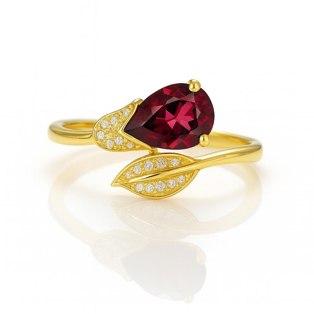 in vendita:  Anello con fiore in oro 14k con granato a pera 6