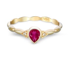 Pear garnet 14k gold ring.