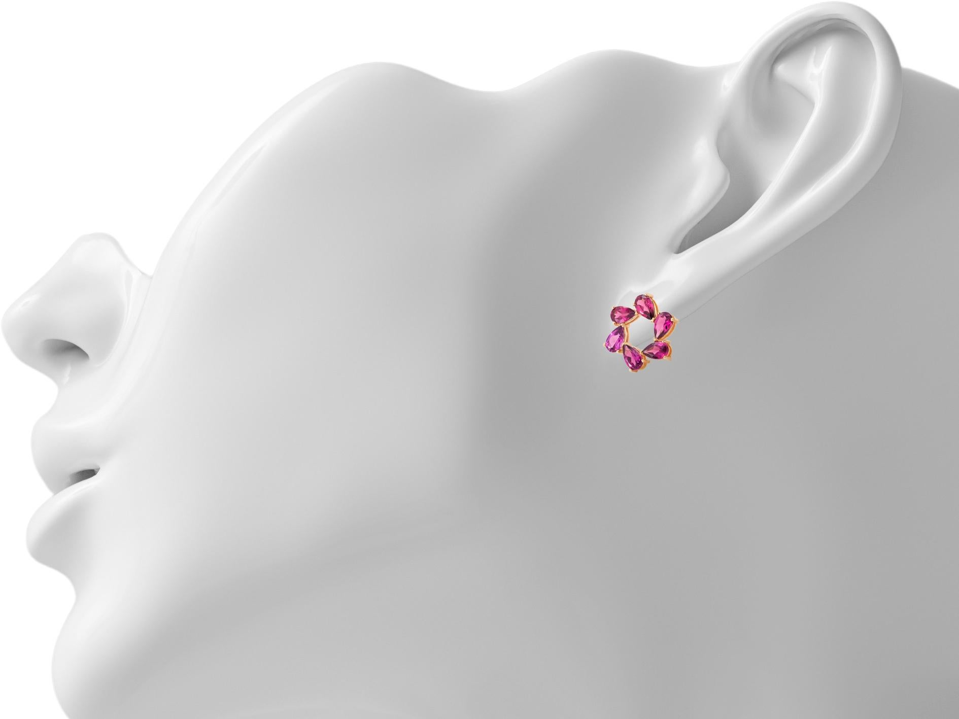 Pear Cut Pear garnet earrings studs in 14k gold.