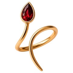 Pear garnet opend ended 14k gold ring
