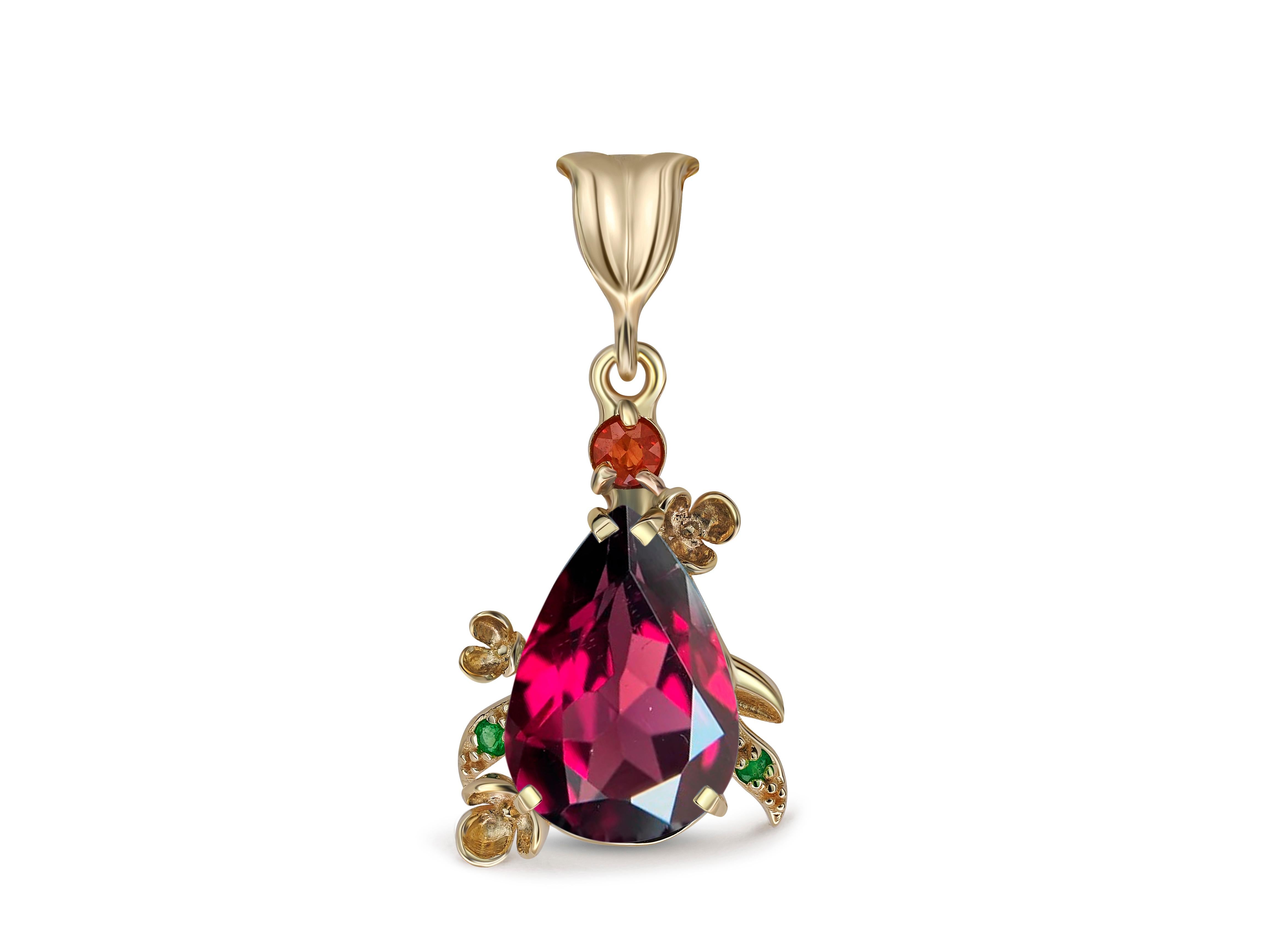 Pear Garnet Pendant in 14 Karat Gold. 
Flower design pendant with natural garnet. Garnet gold pendant. January birthstone pendant. 

Metal: 14k gold
Weight: 2.85 g.
Pendant size: 30x14.5 mm.

Set with garnet
Color - red, pear cut, aprox 2.5