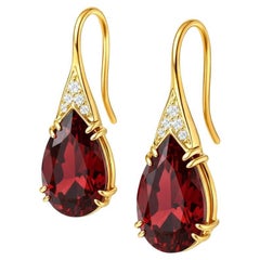 Pear garnet silver, gold earrings