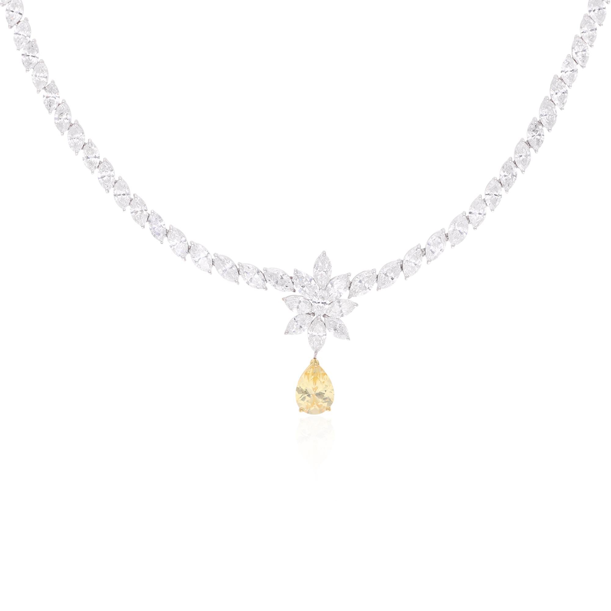 Immerse yourself in the allure of sophistication with this captivating Pear Gemstone Necklace, adorned with shimmering Marquise Diamonds and meticulously handcrafted in elegant 14 Karat White Gold. This exquisite piece of handmade jewelry is a