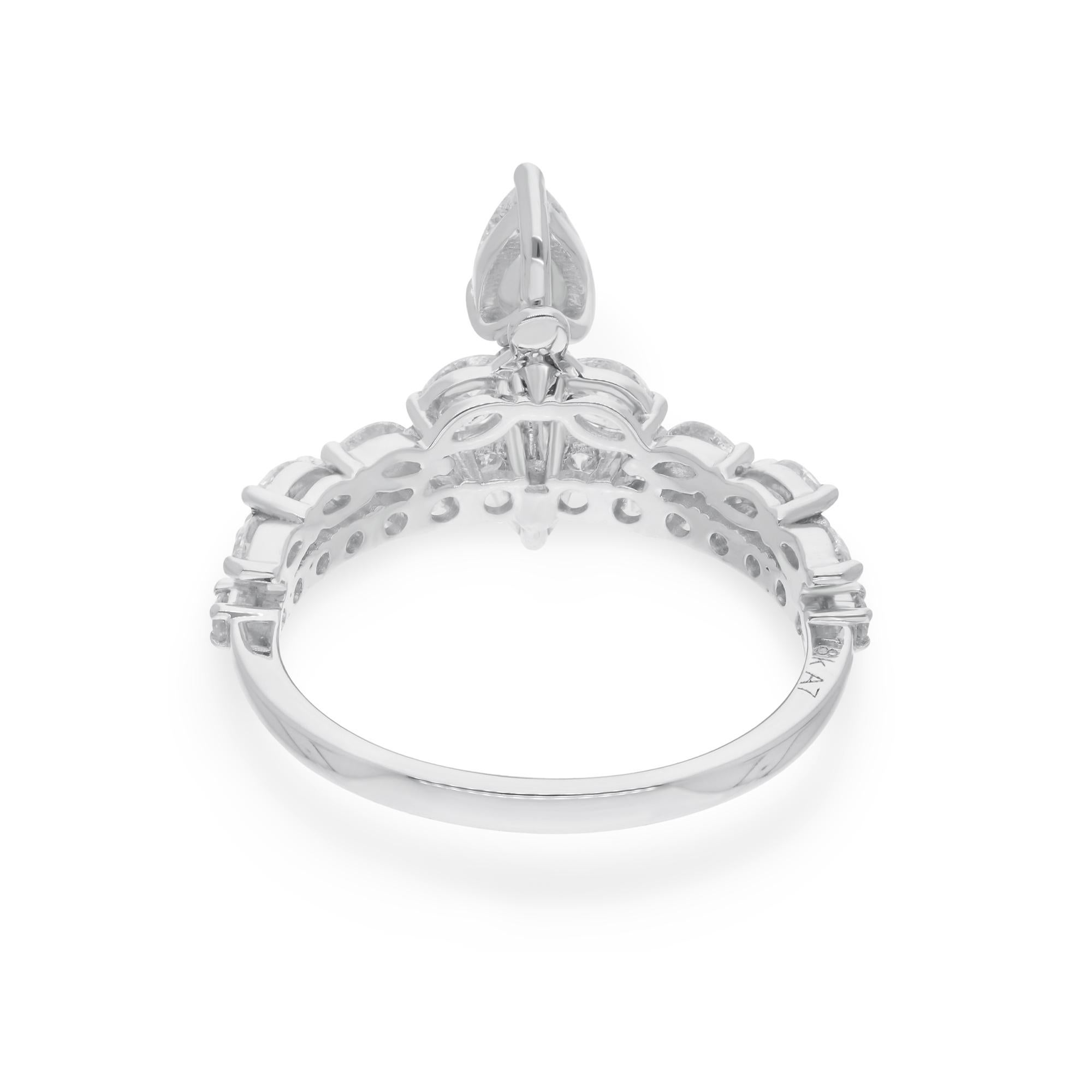 Celebrate the eternal bond of love with this breathtaking Pear Marquise & Round Diamond Wedding Ring, a masterpiece of artisanal craftsmanship handcrafted in luxurious 14 karat white gold. Designed to symbolize the everlasting commitment and