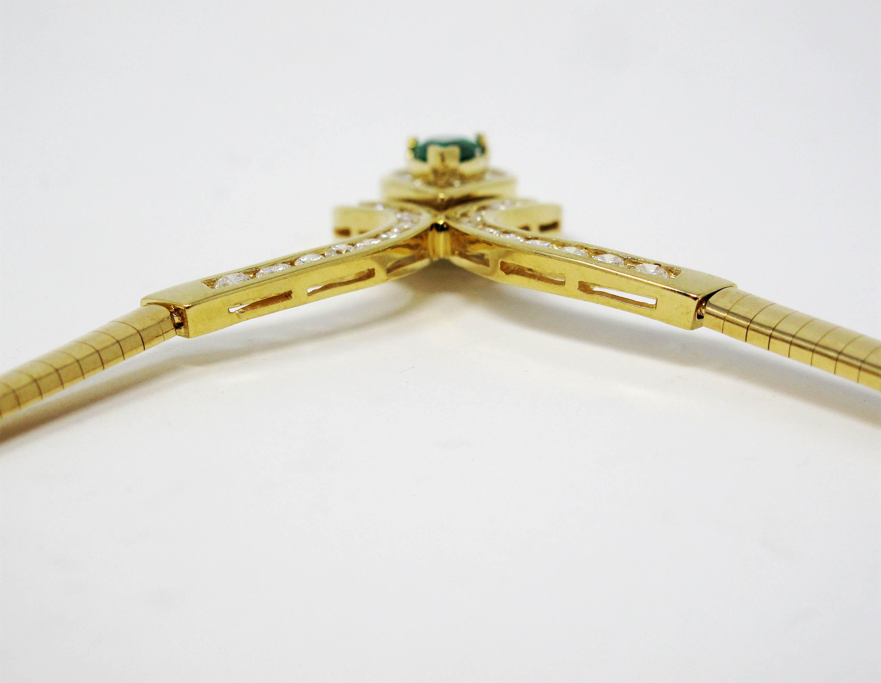 Contemporary Pear Mixed Cut Emerald and Diamond Halo Omega Necklace in 18 Karat Yellow Gold For Sale
