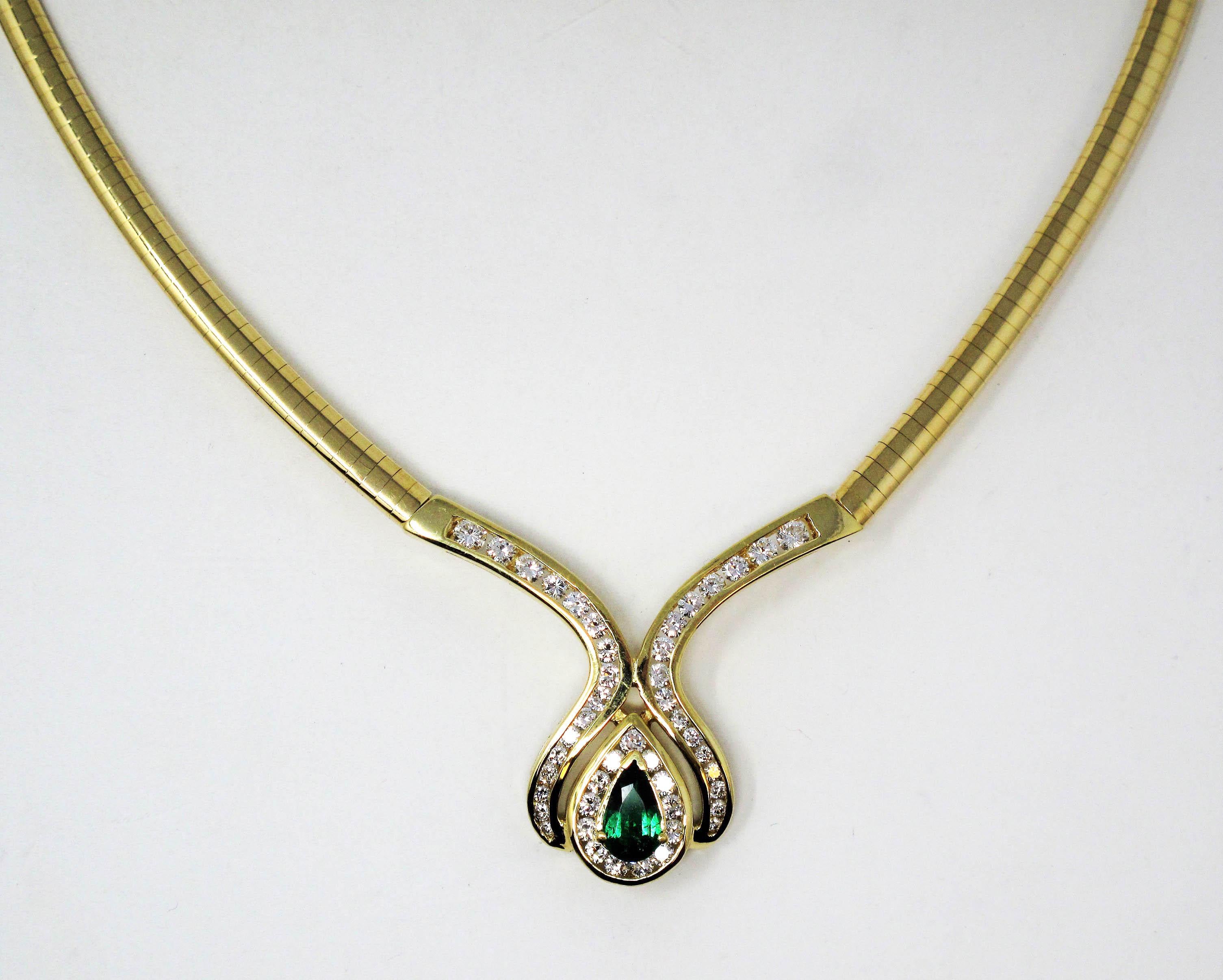 Women's Pear Mixed Cut Emerald and Diamond Halo Omega Necklace in 18 Karat Yellow Gold For Sale