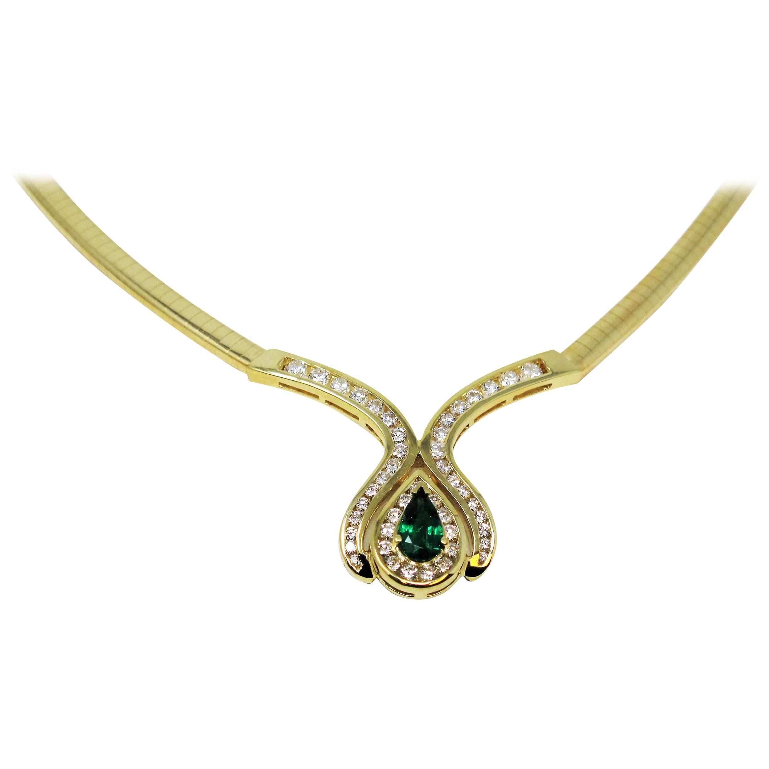 Pear Mixed Cut Emerald and Diamond Halo Omega Necklace in 18 Karat Yellow Gold For Sale