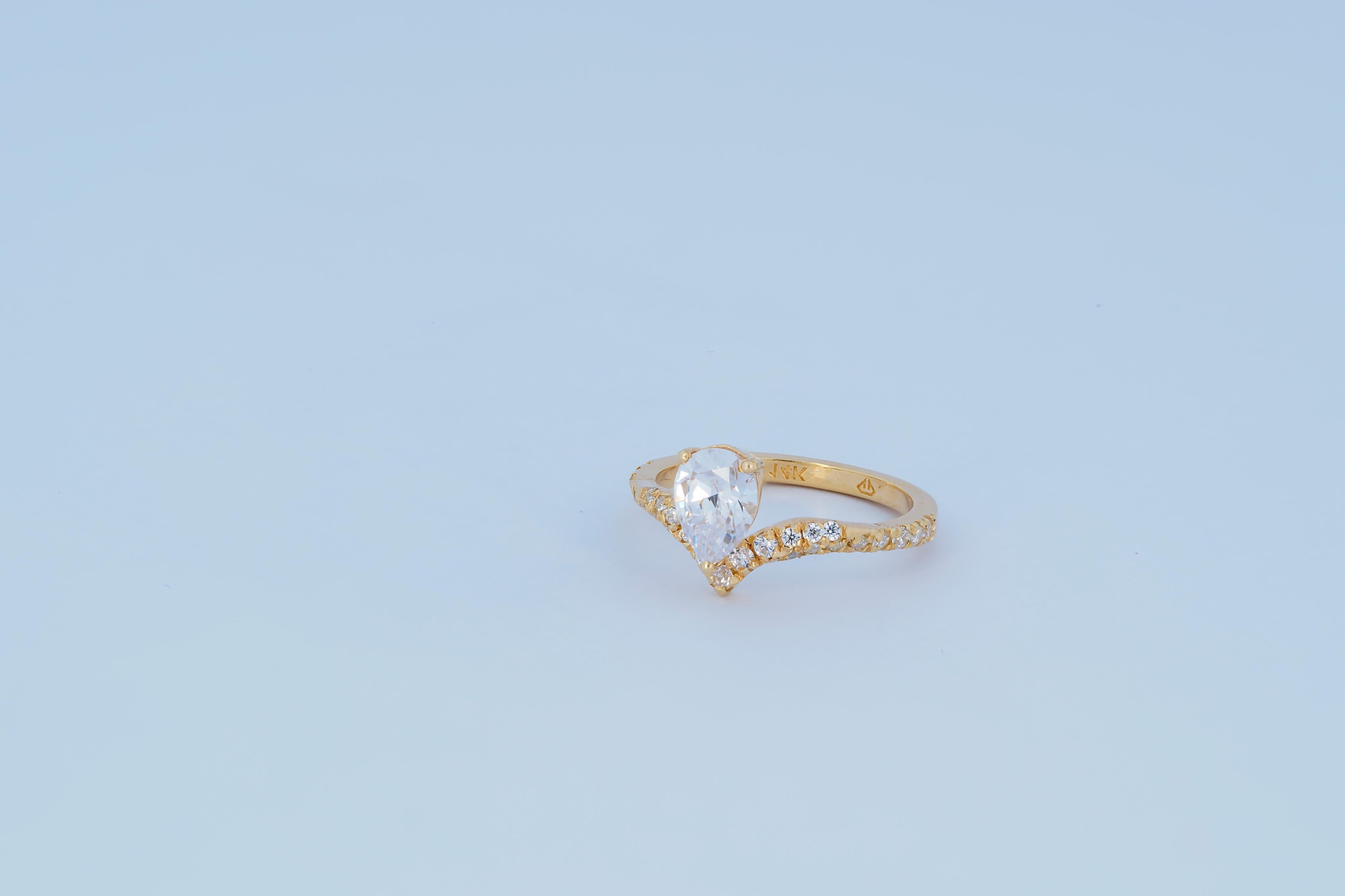Women's or Men's Pear moissanite 14k gold ring.  For Sale