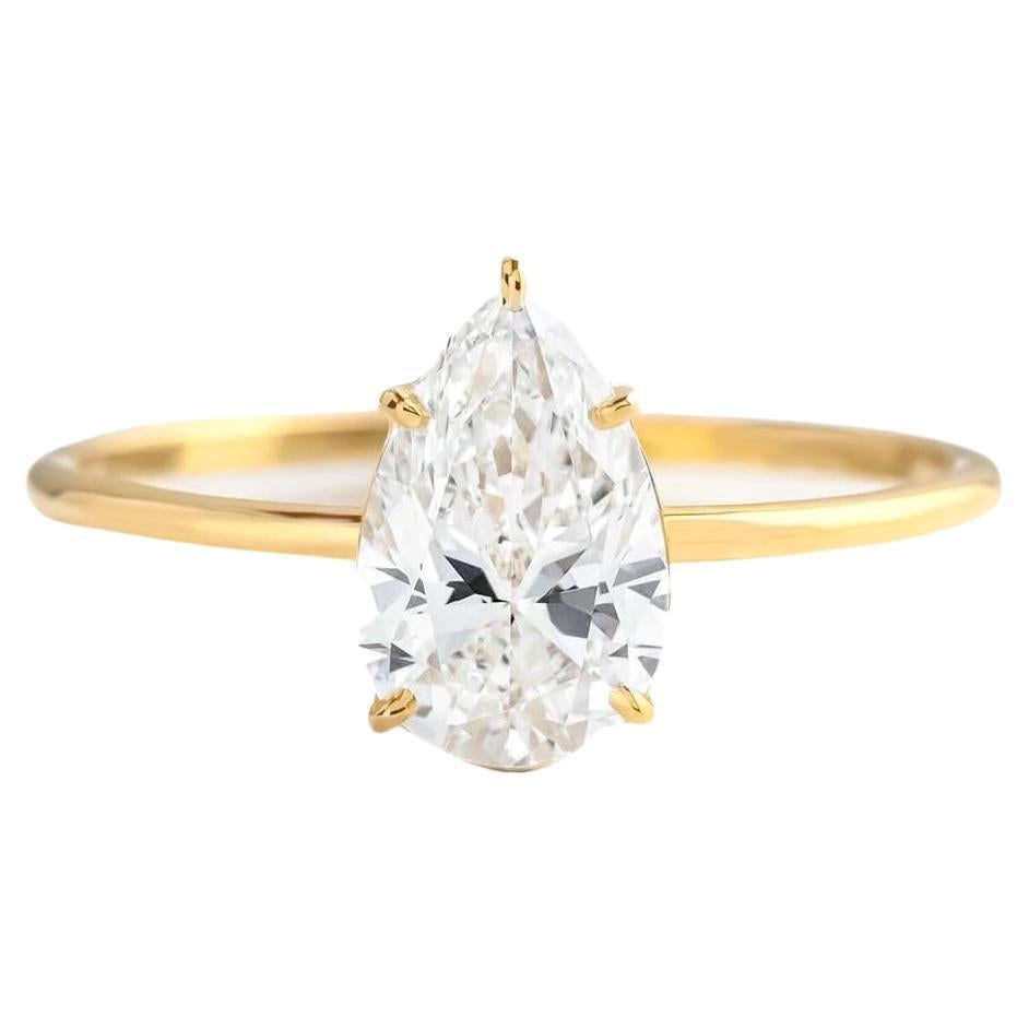Pear moissanite 14k gold ring.