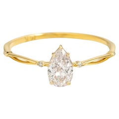 Pear moissanite 14k gold ring