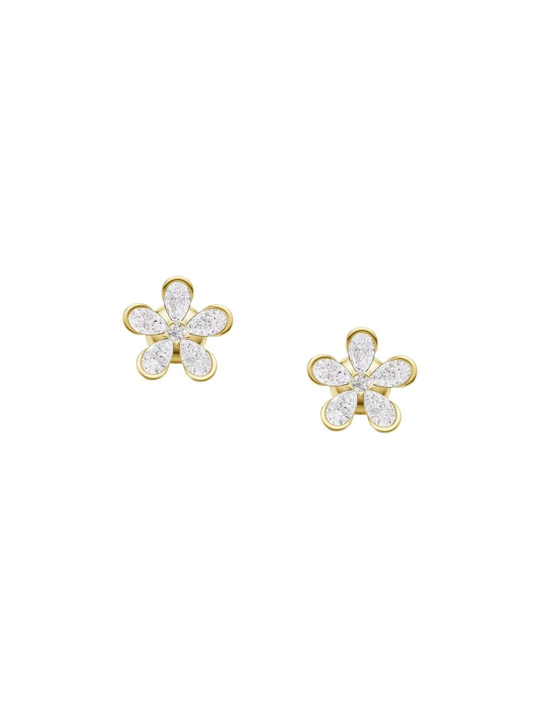 Orecchini a fiore di margherita in oro 14k. Orecchini a fiore con moissaniti a pera. Orecchini a cinque petali. Orecchini per tutti i giorni. Orecchini Forget me not con moissaniti.

Peso: 3.8 gr
Metallo: oro 14k

Pietre: moissaniti D/V, taglio a