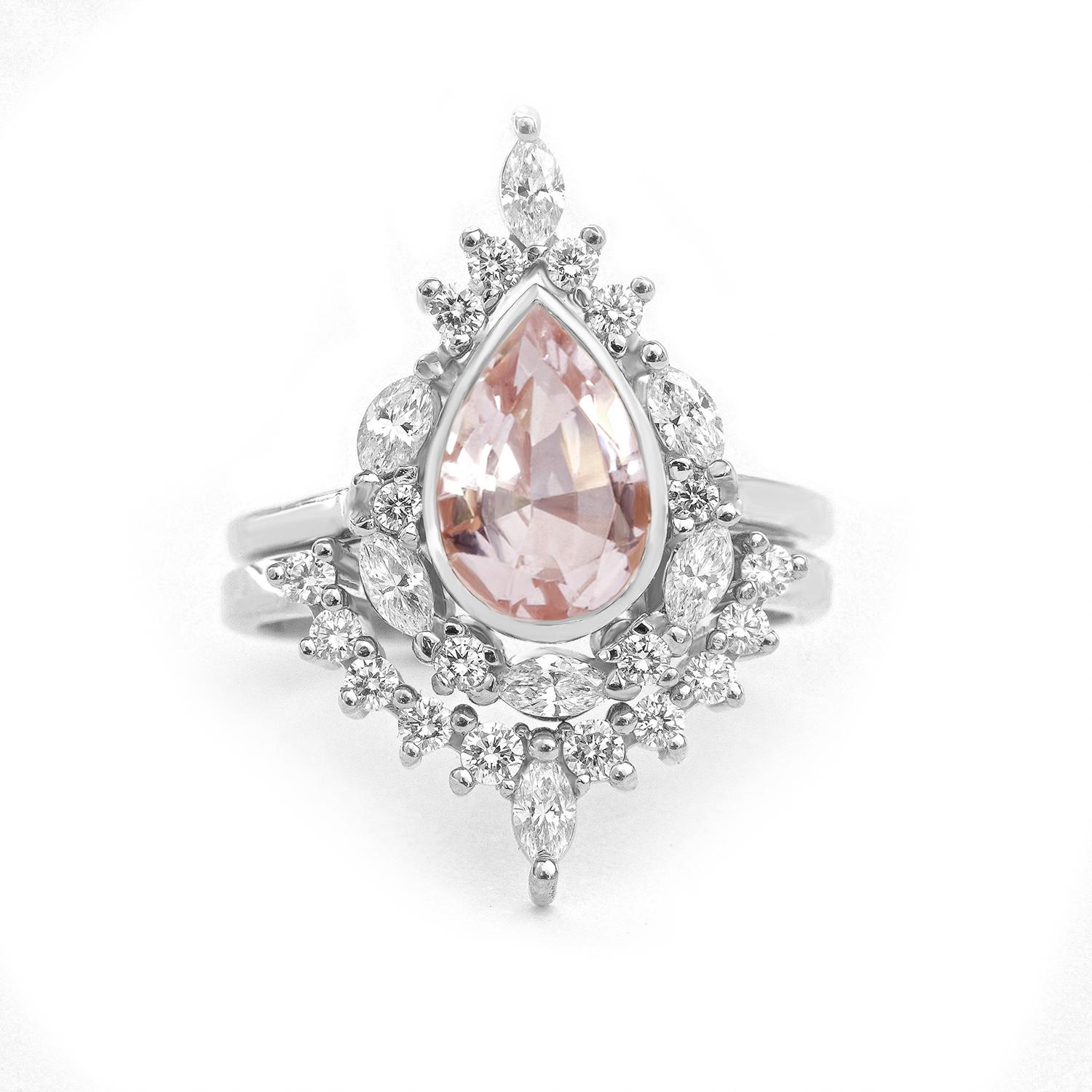 Unique Morganite Engagement Rings Set - Eva.
The Eva ring is named after the first woman Eva who is graceful, passionate, and full of energy & laughter. 
Handmade with care. 
An original design by Silly Shiny Diamonds. 

Details: 
* Center Stone