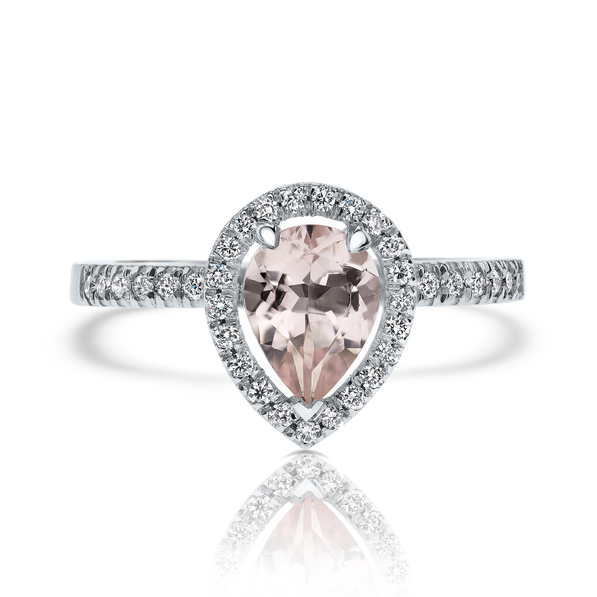 1.25 CT Pear Shaped Morganite Diamond Ring in 14 Karat White Gold -Shlomit Rogel

Pear shaped morganite halo style diamond ring, set with a pinkish-peachy clear 0.90 carat natural morganite gemstone. 
In the ring there are additional 38 diamonds