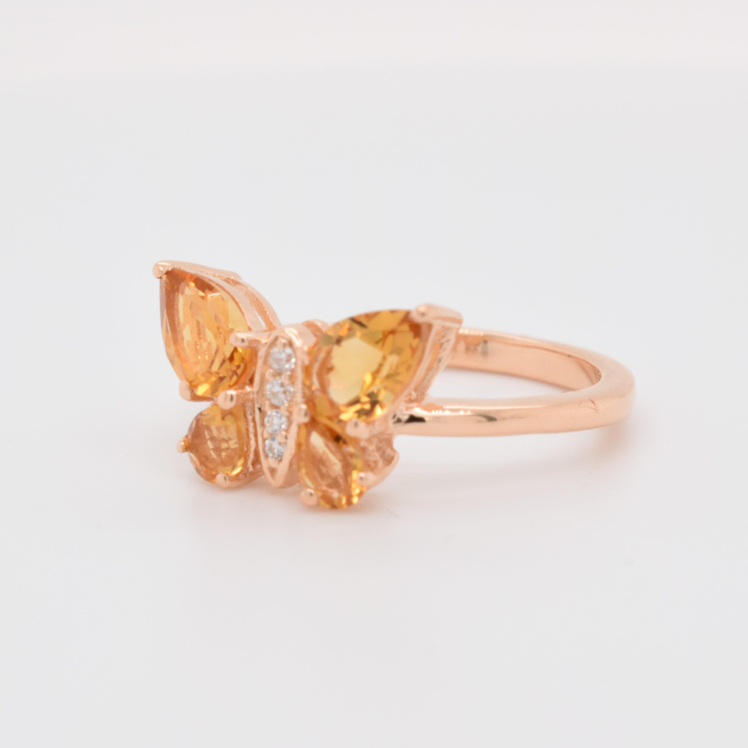 Pear Shape Citrine Gemstone And CZ beautifully crafted  in a Ring. A fiery Yellow Color November Birthstone. For a special occasion like Engagement or Proposal or may be as a gift for a special person.

Primary Stone Size - 6x4 & 4x3 mm