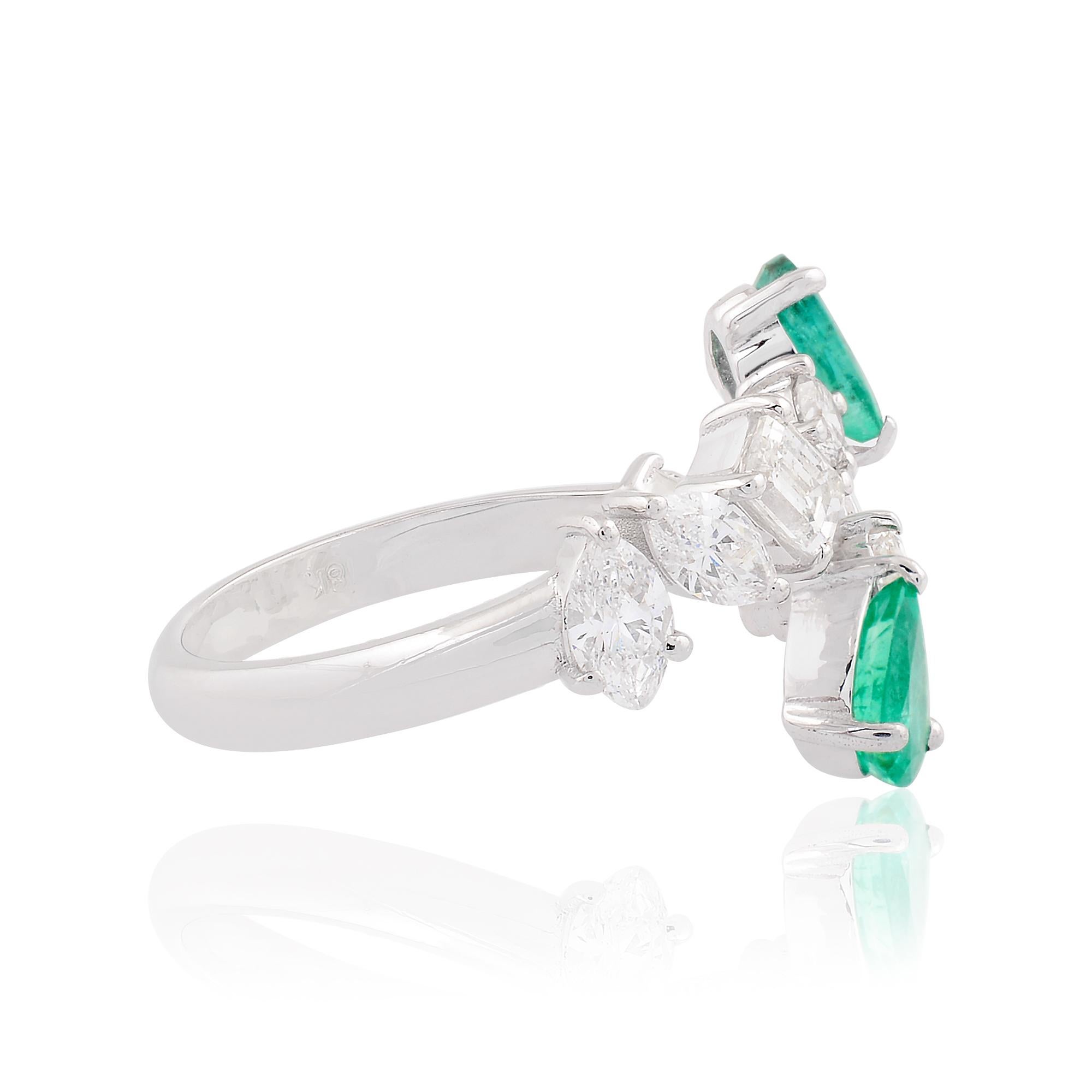 Step into the enchanting world of luxury and elegance with this Pear Natural Emerald Gemstone Wrap Cuff Ring, adorned with dazzling diamonds and meticulously crafted in radiant 18 karat white gold. This exquisite ring is a true testament to