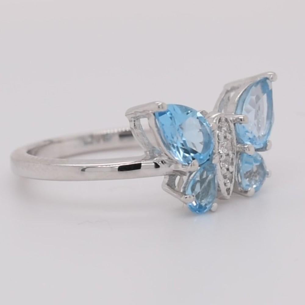 Pear Natural Swiss Blue Topaz And CZ Rhodium over Sterling Silver Ring In New Condition For Sale In Fort Lee, NJ
