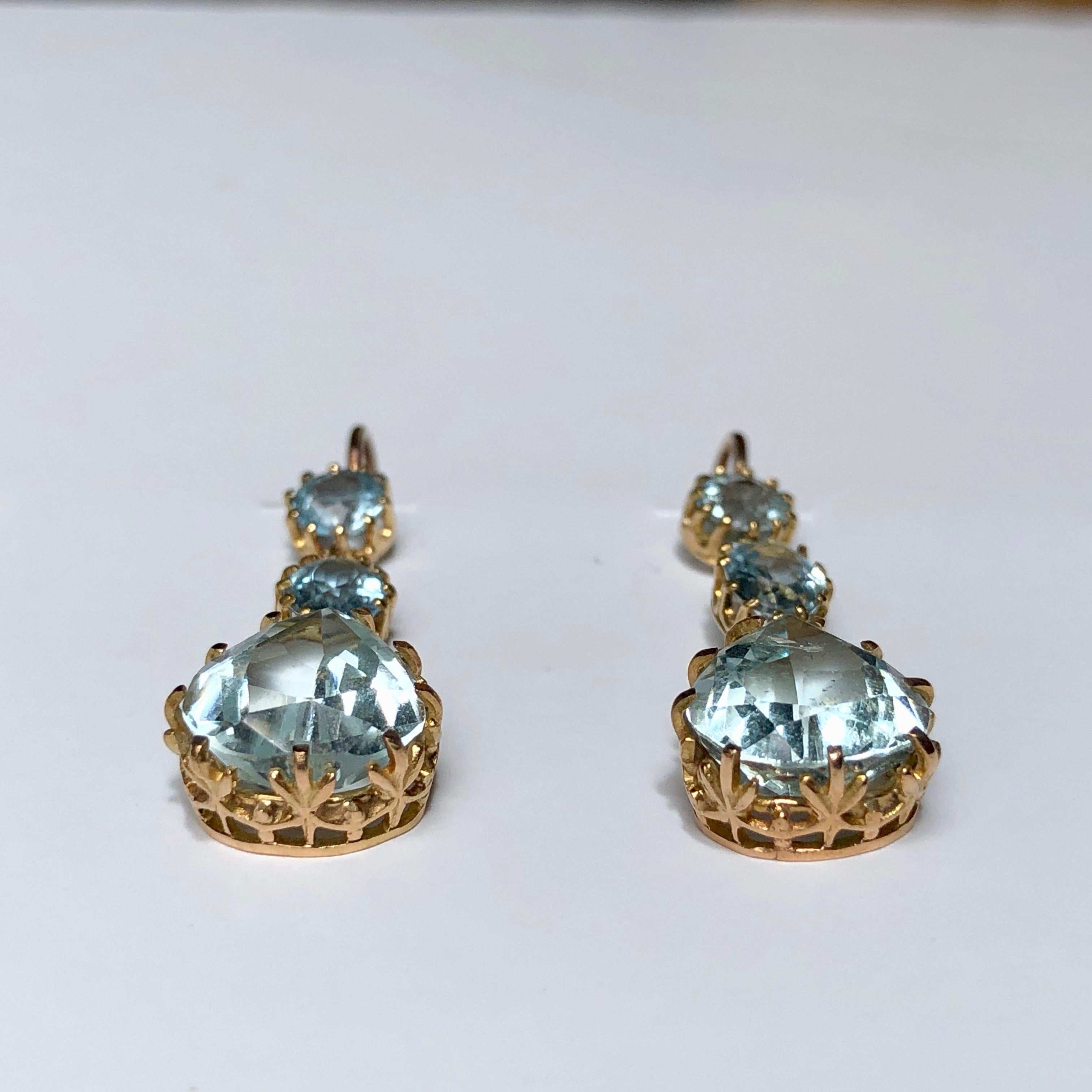 A Regal Pair of Pendant Earrings

Each designed as a pear-shape aquamarine, suspended from an oval and circular-shape aquamarine line. 

Length 3.3cms. 

Weight 4.5gms.

The birthstone for March Aquamarine 

Aquamarine evokes the purity of
